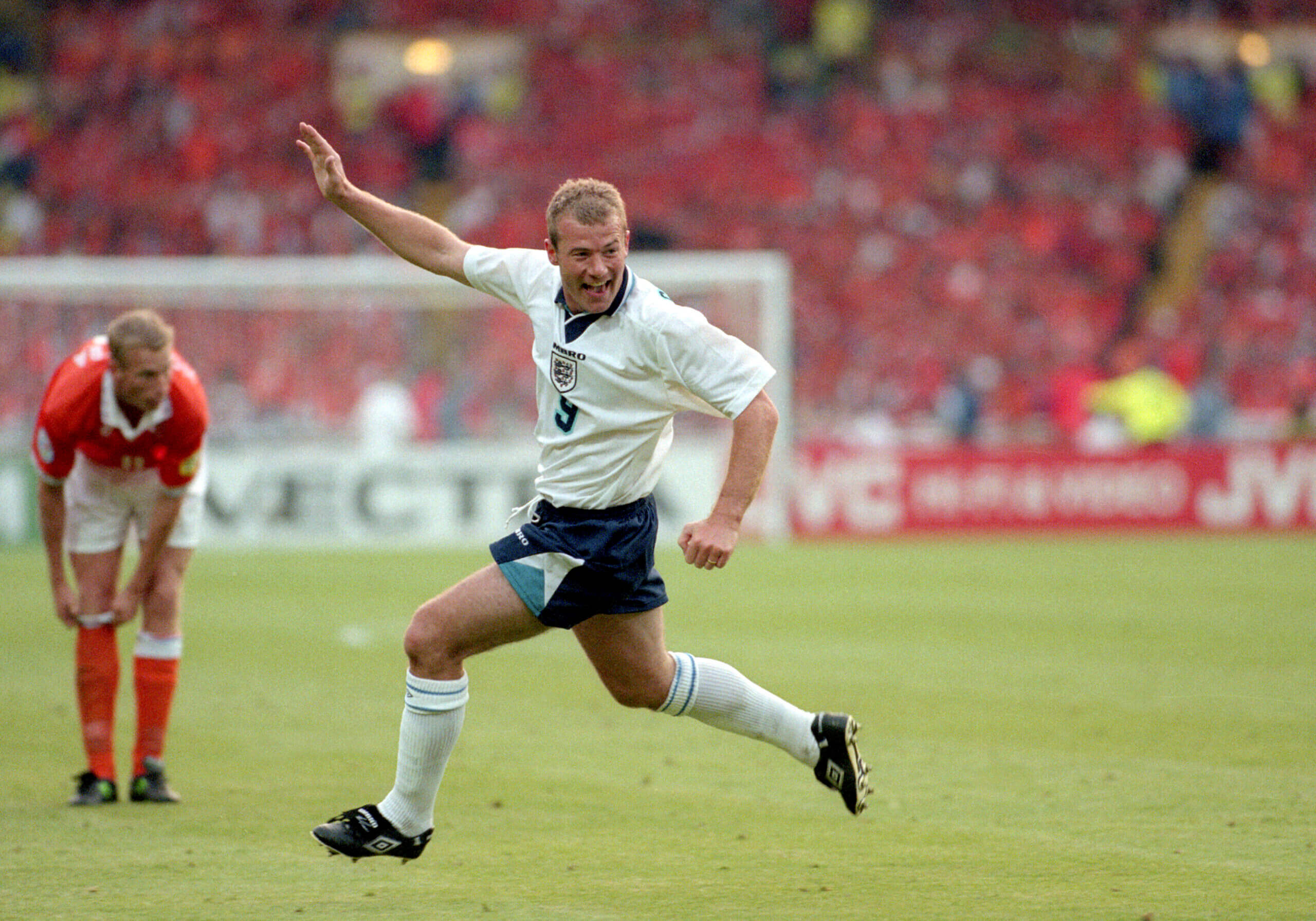 Alan Shearer celebrates scoring against the Netherlands at Euro 96