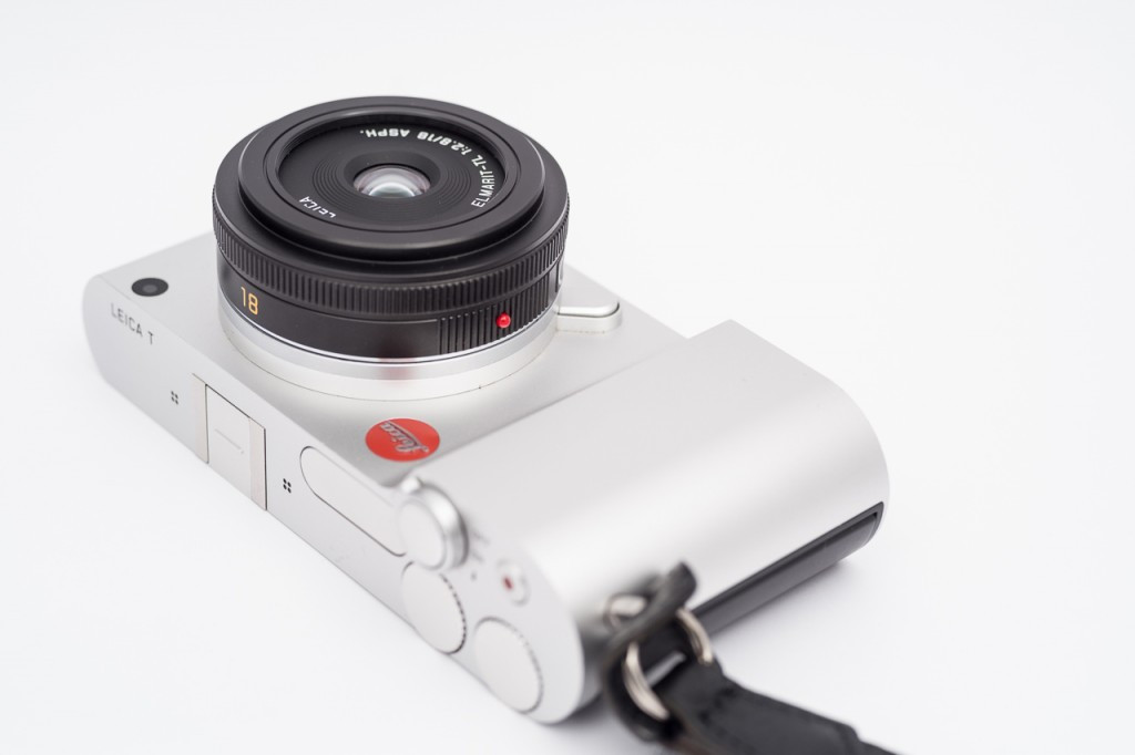 Leica T camera with Elmarit-TL 18mm lens, showcasing its compact size ideal for travel and discreet street photography.