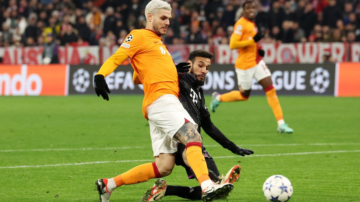 Soccer match at stadium with floodlights, symbolizing UEFA Champions League broadcast rights secured by TRT in Turkey for 2024-2027 cycle.