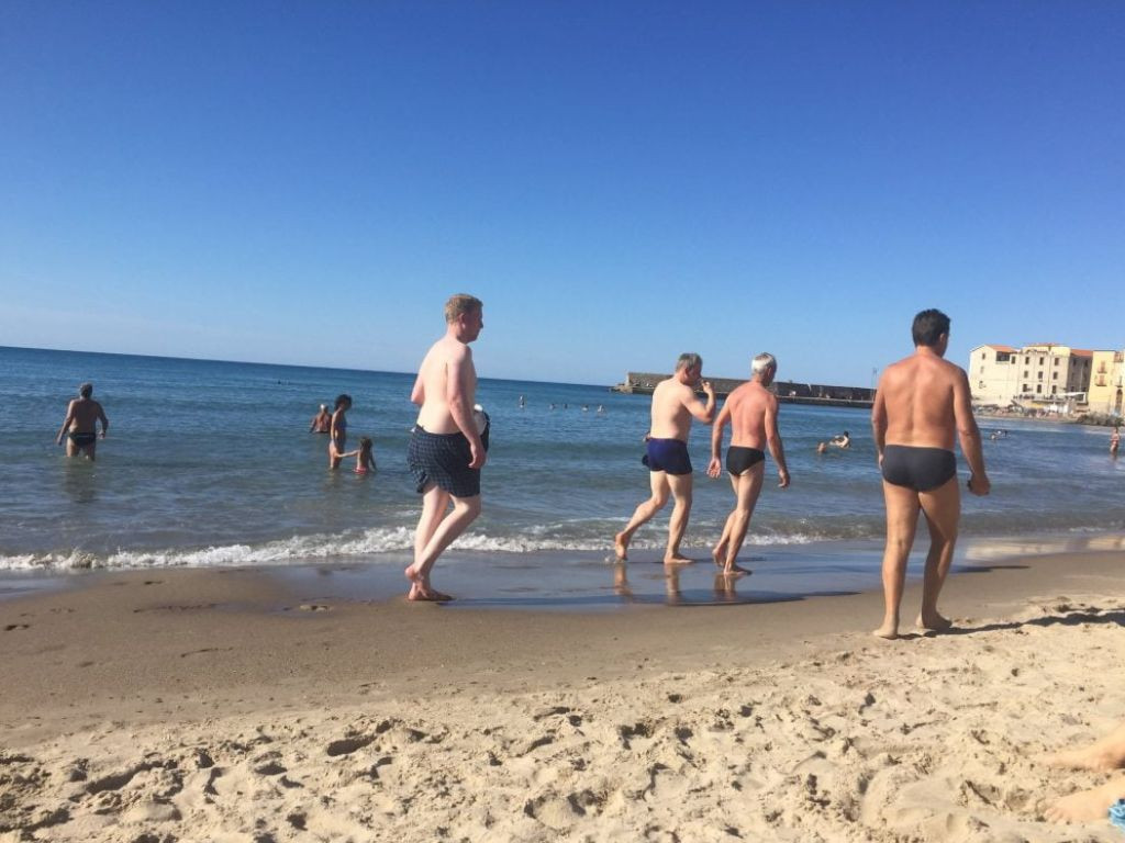 men on a european beach