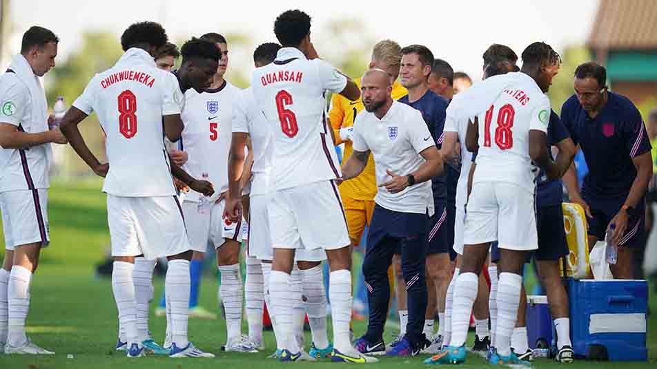Young Lions head coach Ian Foster speaks to his players during their U19 EURO semi-final win over Italy