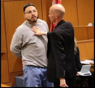 Euren Balbuena is seen after an altercation during the reading of victim impact statements denoting the emotional intensity and chaos surrounding the sentencing.